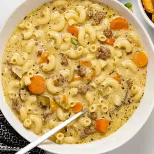 A rustic bowl of hearty homemade soup ready to be enjoyed.