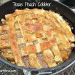 Texas Peach Cobbler in a Dutch Oven 5 Golden baked Texas Peach Cobbler- Dutch Oven Camping Recipes served in a cast iron pot