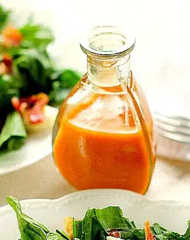 Fresh spinach salad tossed with a light vinaigrette and cherry tomatoes
